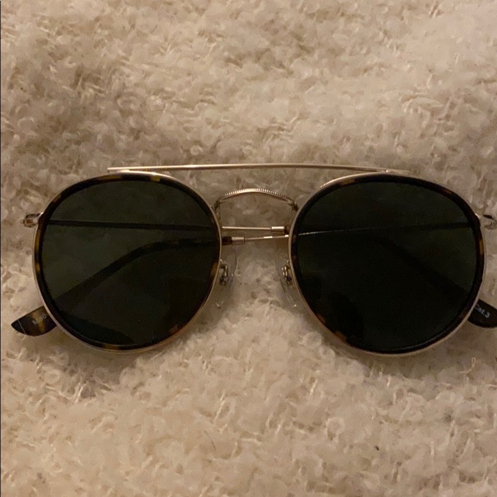 Tortoise shell and gold sunglasses